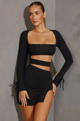 Enya Minivestido negro de manga larga con aberturas