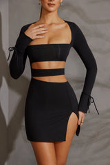 Enya Minivestido negro de manga larga con aberturas