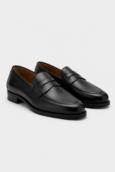 Mocasín de piel con detalle antifaz.