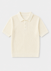 Polo de punto calado confeccionado en 100% algodón.