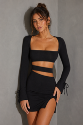 Lorna Minivestido negro de manga larga con aberturas
