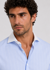 Camisa de vestir slim fit confeccionada en 100% algodón.
