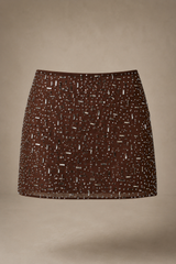 Tisiny- Minifalda transparente con cintura en V adornada en color cacao intenso.